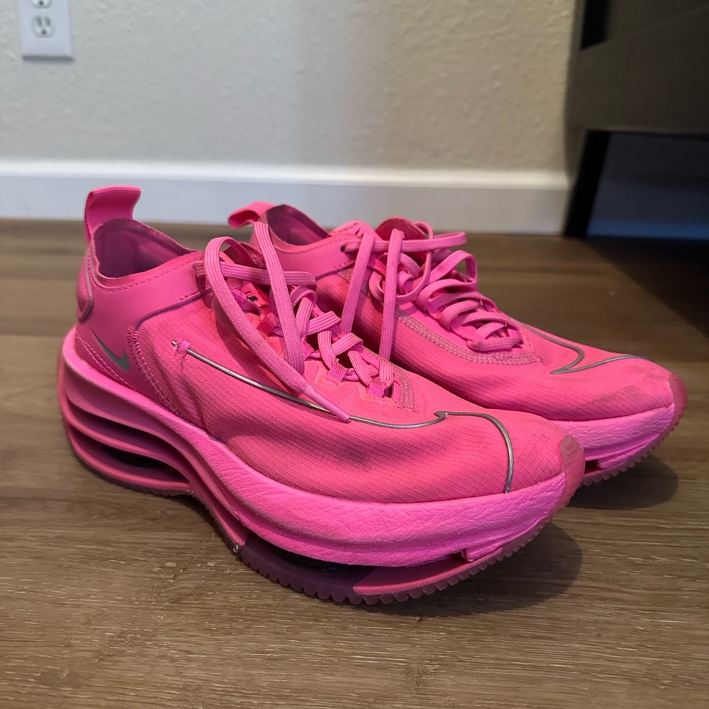 Neon pink Nikes